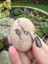 Load image into Gallery viewer, Graphic Feldspar and Smoky Quartz Palmstone
