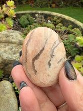 Load image into Gallery viewer, Graphic Feldspar and Smoky Quartz Palmstone
