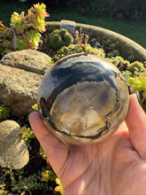 Load image into Gallery viewer, Uv Reactive Volcano Agate Sphere
