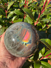 Load image into Gallery viewer, Large Pink Flash Labradorite Sphere 13cm diameter
